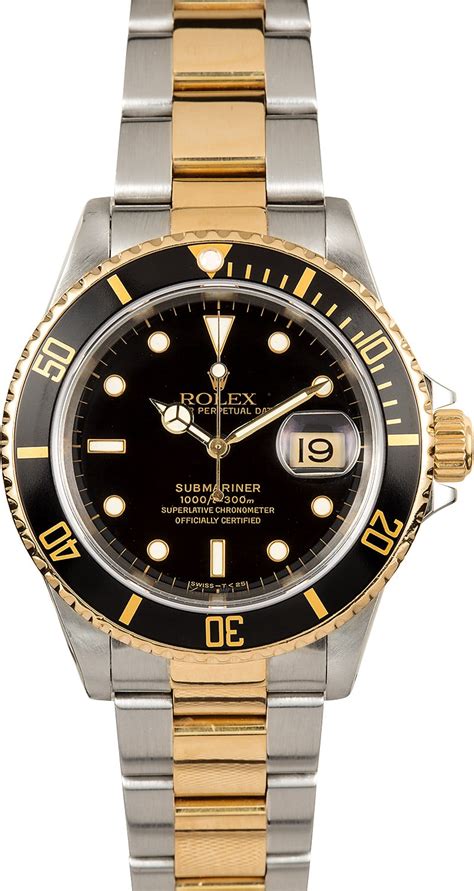 black gold and silver rolex